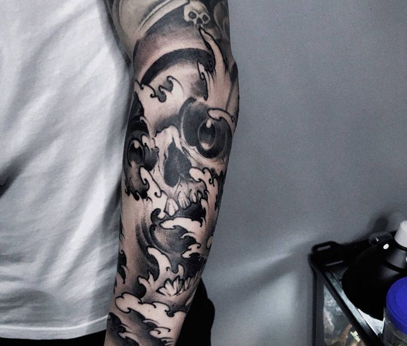 浪+嘎巴拉纹身图片_成品手部传统鬼神纹身图案