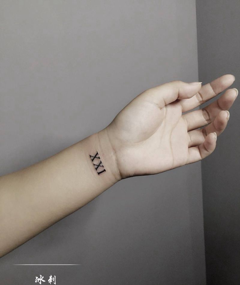 罗马数字纹身图片_手臂传统清新几何字符纹身图案