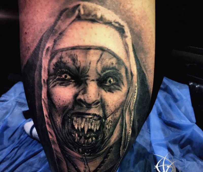 修女纹身图片_腿部纹身图案