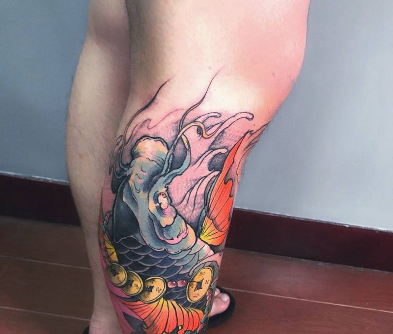 锦鲤纹身图片_成品腿部传统动物纹身图案