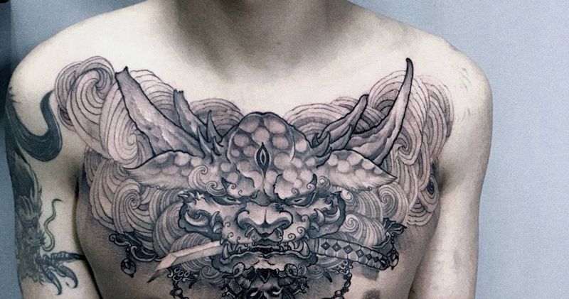 唐狮纹身图片_成品胸部传统鬼神纹身图案