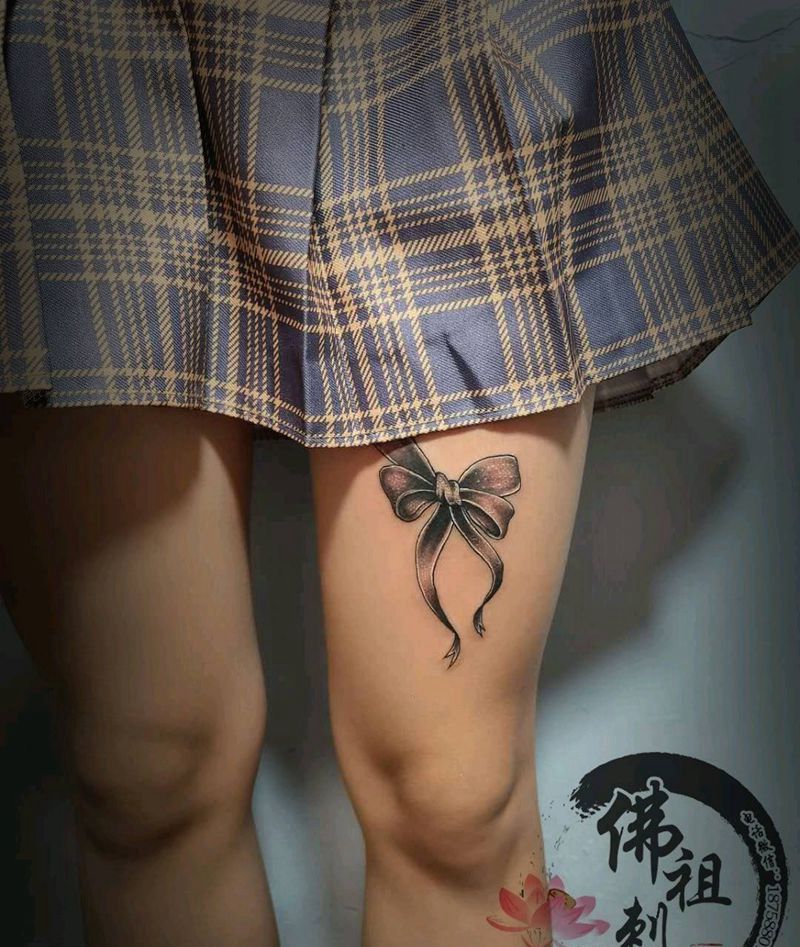 蝴蝶结纹身图片_腿部腰部新传统点刺纹身图案