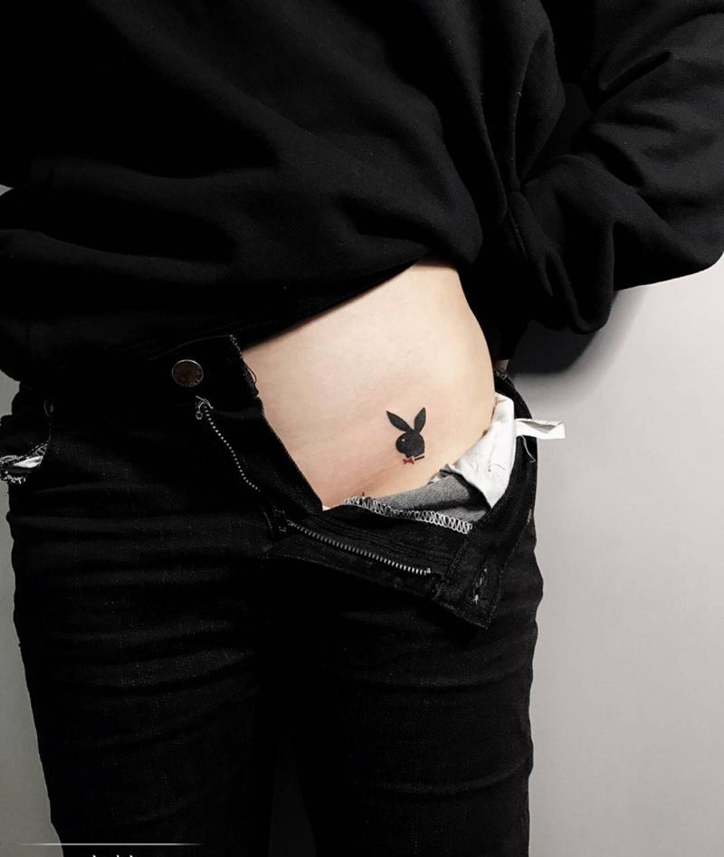 花花公子纹身图片_图腾传统腰部纹身图案