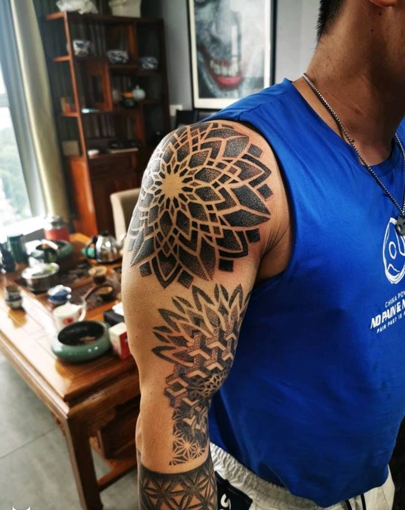 点刺花臂纹身图片_手臂纹身图案