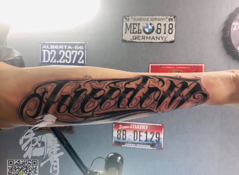 自由纹身图片_手臂花体字纹身图案