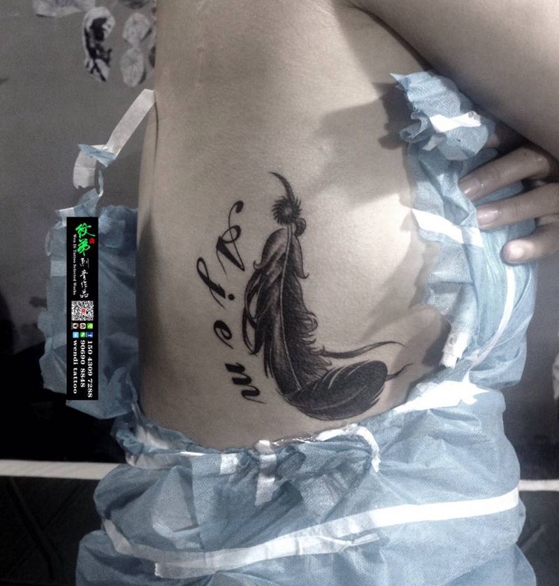 羽毛纹身图片_成品腰部腹部胸部清新动物纹身图案