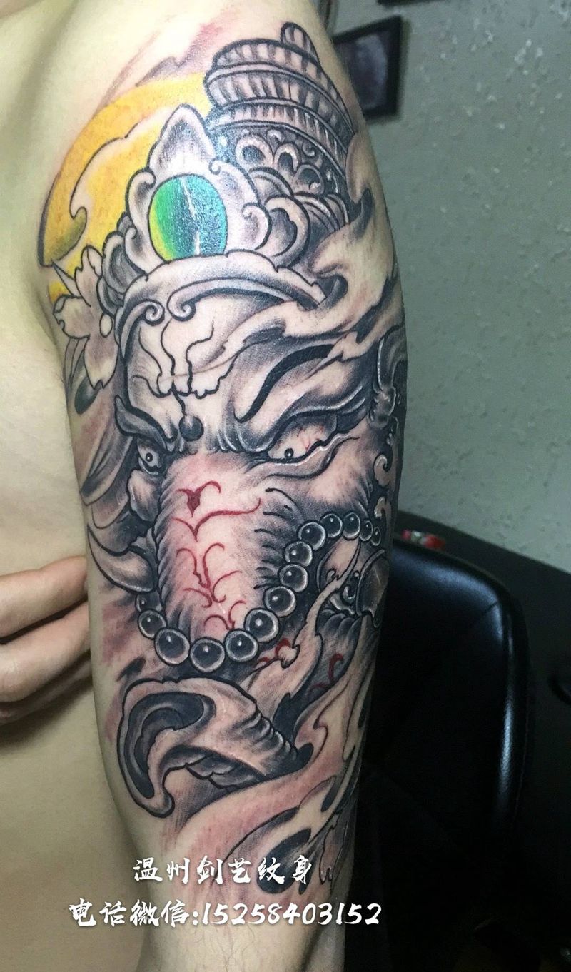 大臂象神纹身图片