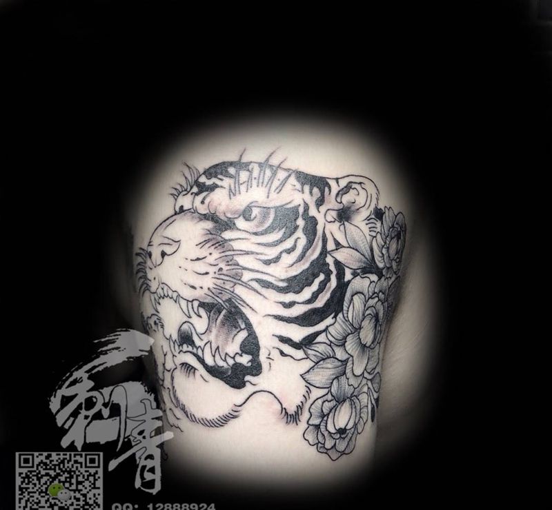 老虎纹身图片_成品传统欧美动物植物手臂纹身图案