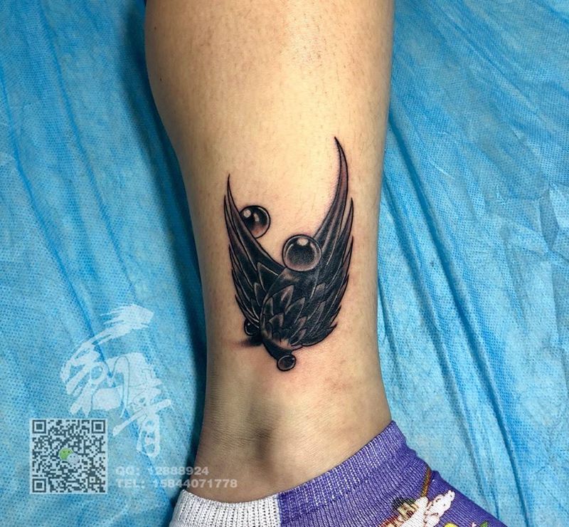 翅膀遮盖纹身图片