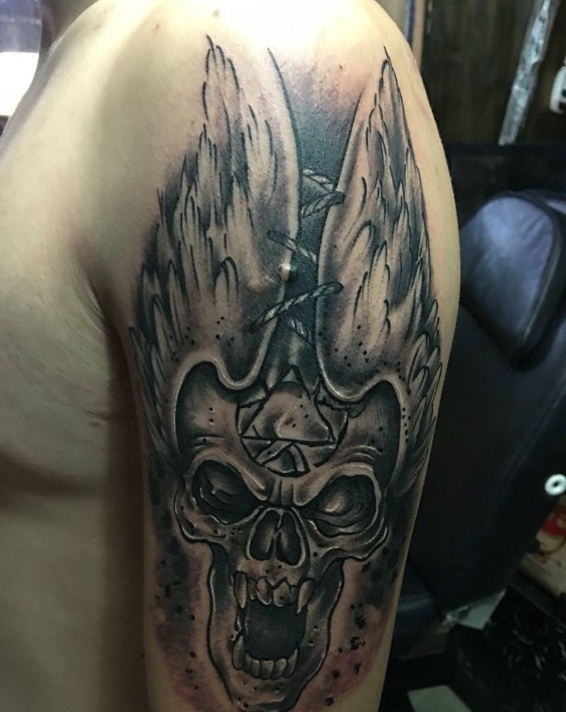 骷髅遮盖纹身图片