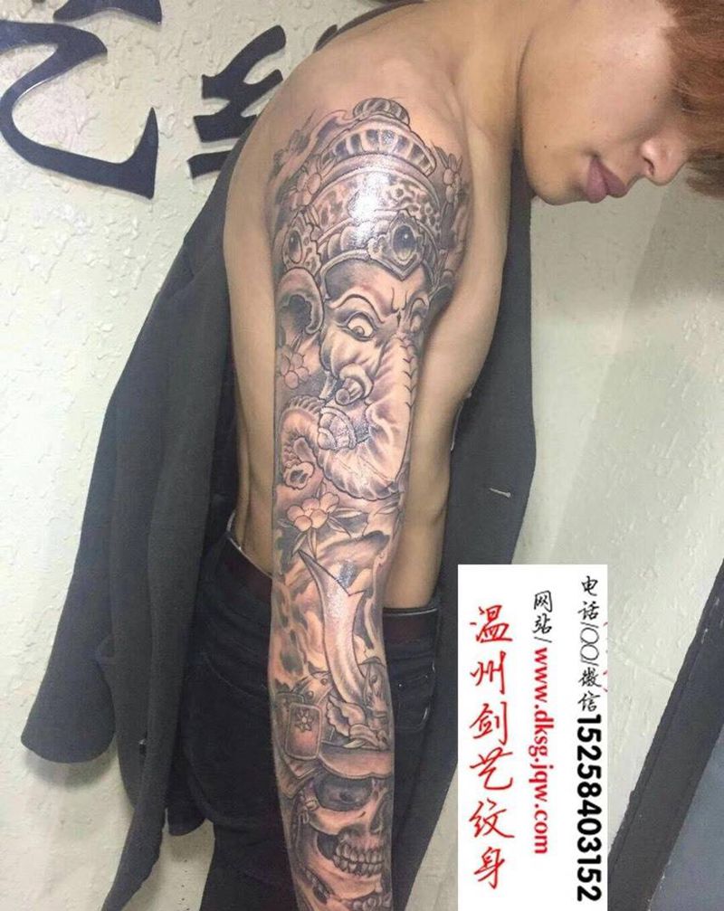 黑灰花臂纹身图片