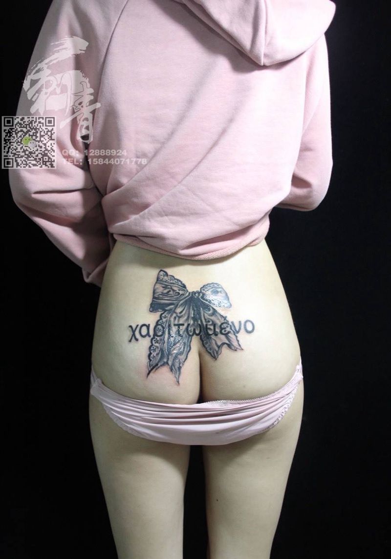 蝴蝶结纹身图片_成品手稿腰部欧美传统清新纹身图案