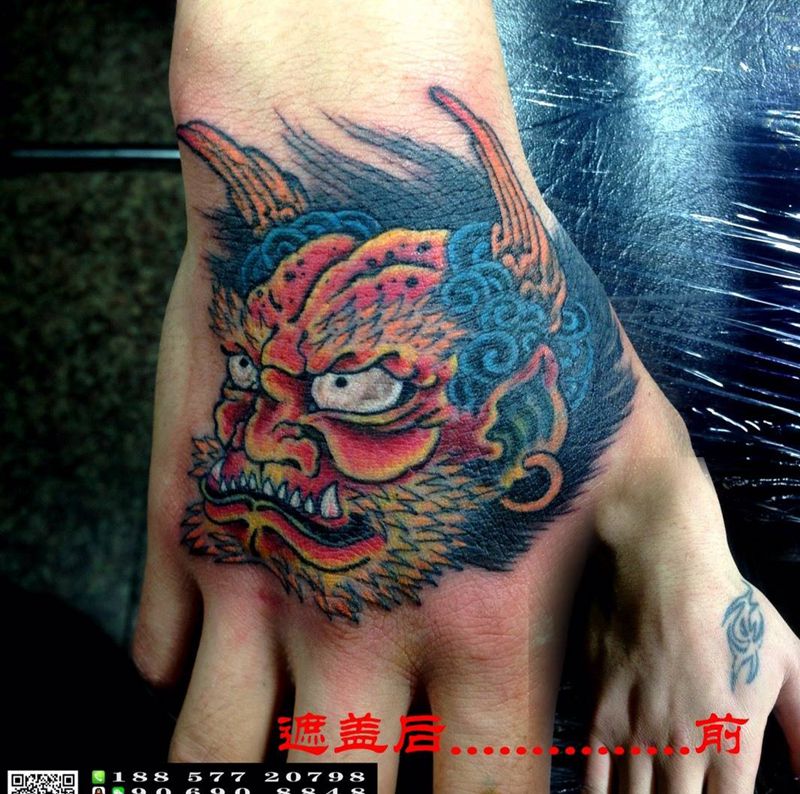 遮盖纹身图片_成品手部传统肖像鬼神纹身图案