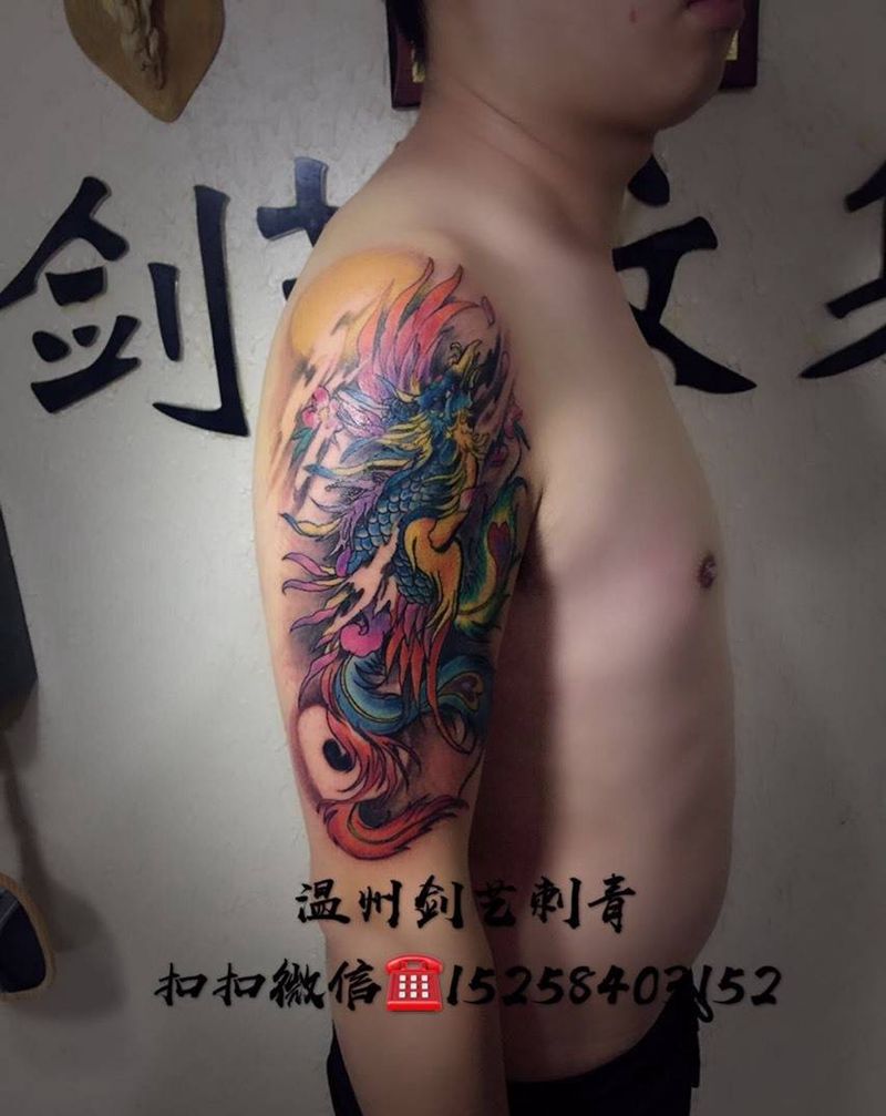 大臂朱雀纹身图片