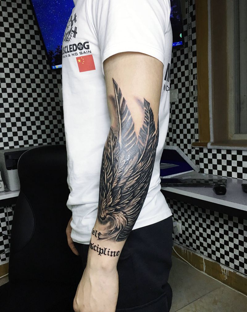 小臂翅膀遮盖疤痕纹身图片_手臂新传统纹身图案