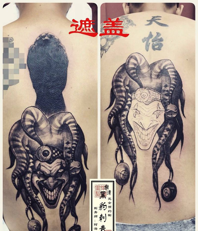 小丑遮盖纹身图片