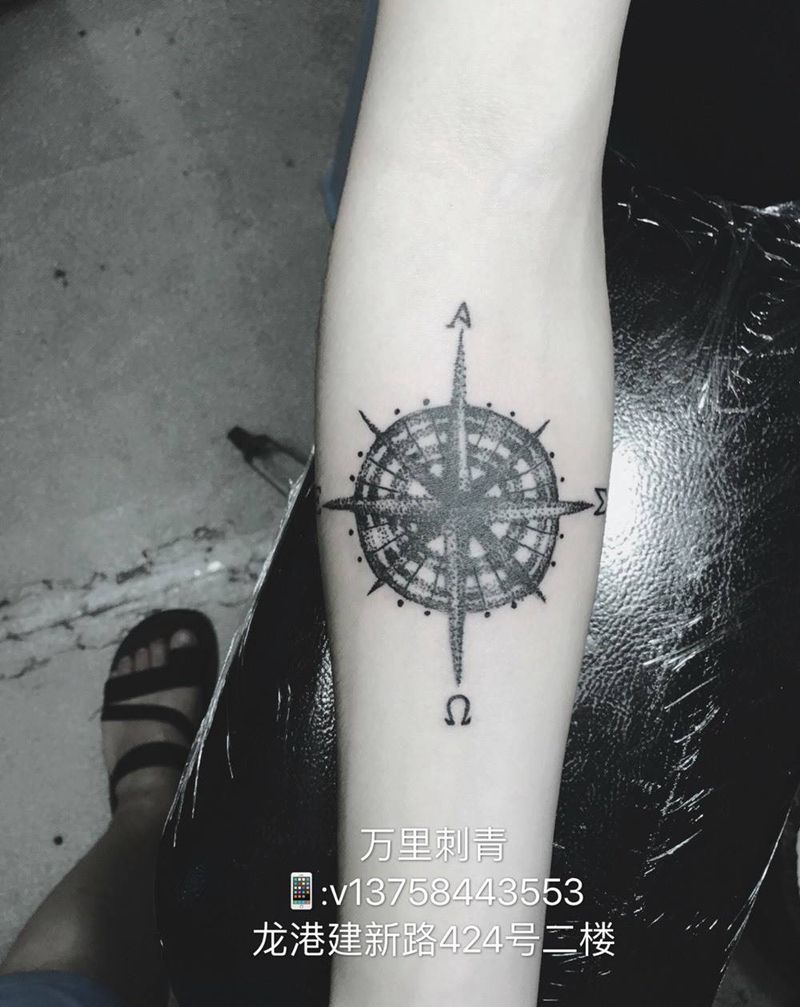点刺指南针纹身图片