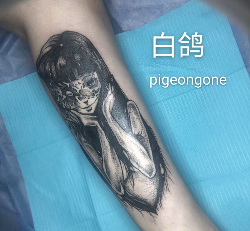 《富江》纹身图片_腿部点刺富江暗黑伊藤润二纹身图案