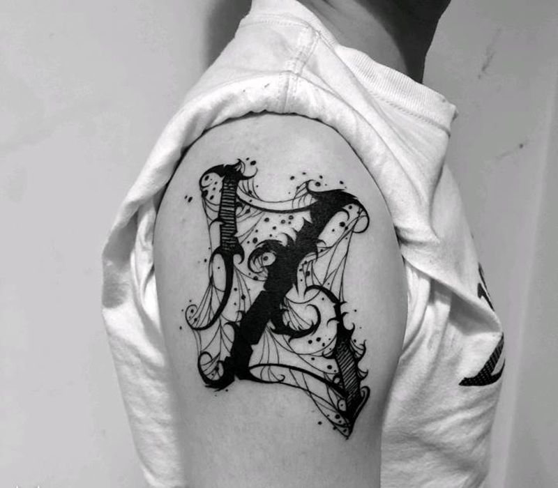 花体字纹身图片_手臂几何纹身图案