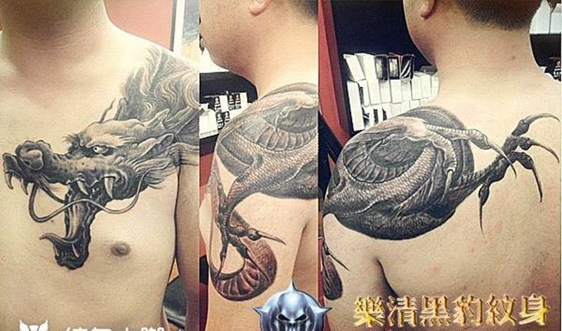 披肩带鱼纹身图片