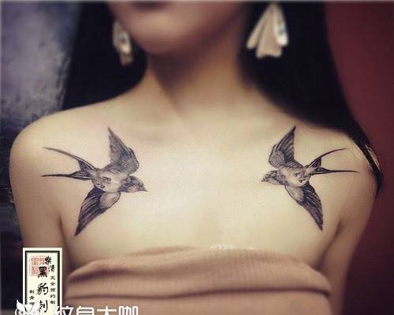 双燕纹身图片