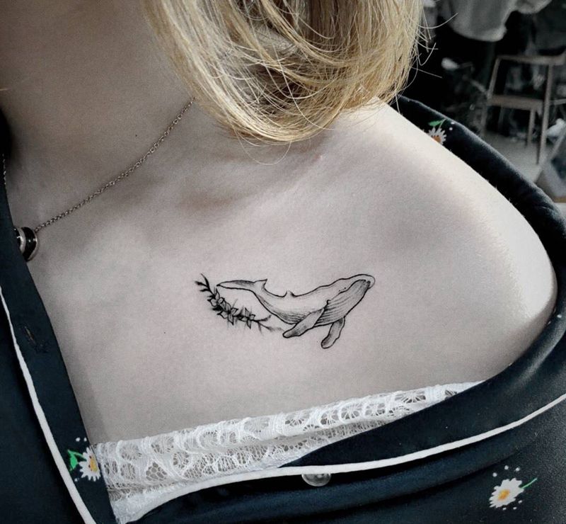 鲸纹身图片_成品胸部清新几何动物字符纹身图案