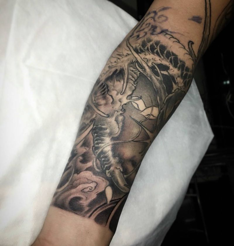 龙手臂纹身图片_成品手臂传统动物纹身图案