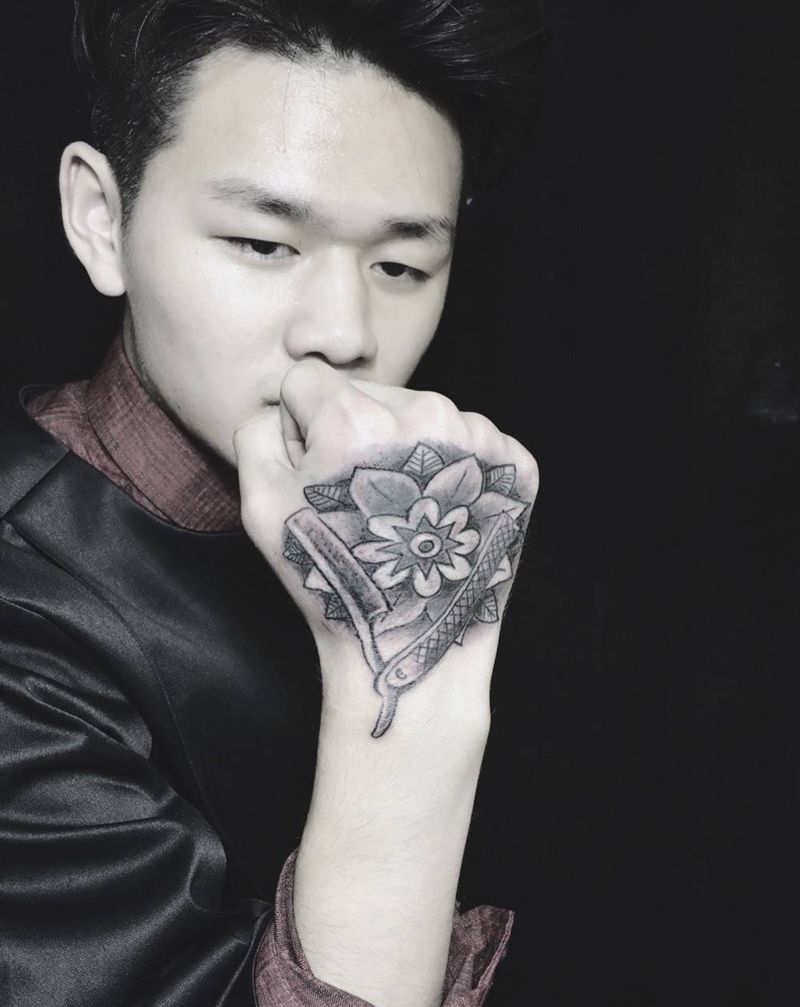 手背遮盖纹身图片