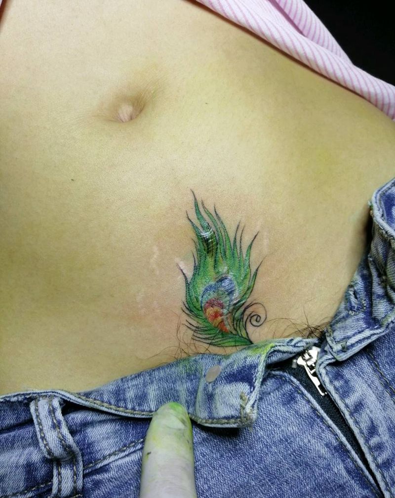 羽毛遮盖伤疤纹身图片_腹部纹身图案