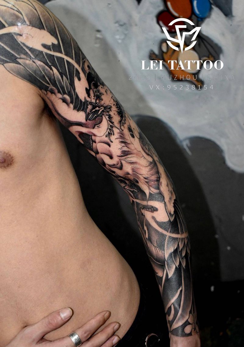 凤凰花臂纹身图片