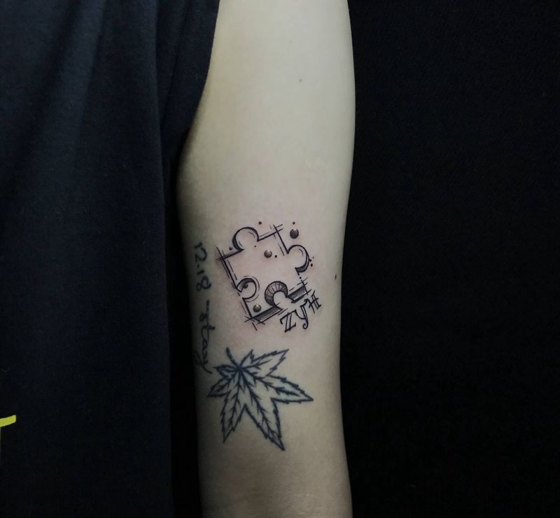 小拼图纹身图片_手臂几何纹身图案