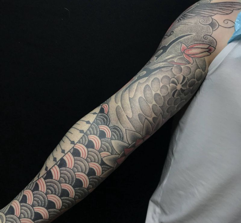 几何花臂纹身图片_手臂图腾点刺纹身图案