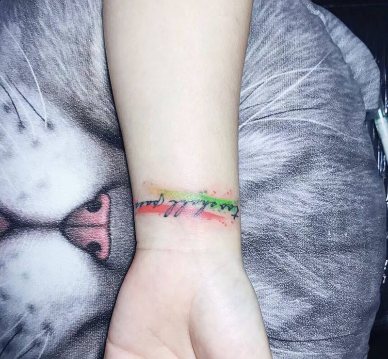 泼墨字母纹身图片_手臂纹身图案