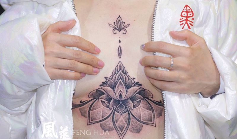 胸下梵花纹身图片_胸部腹部点刺图腾梵花纹身图案