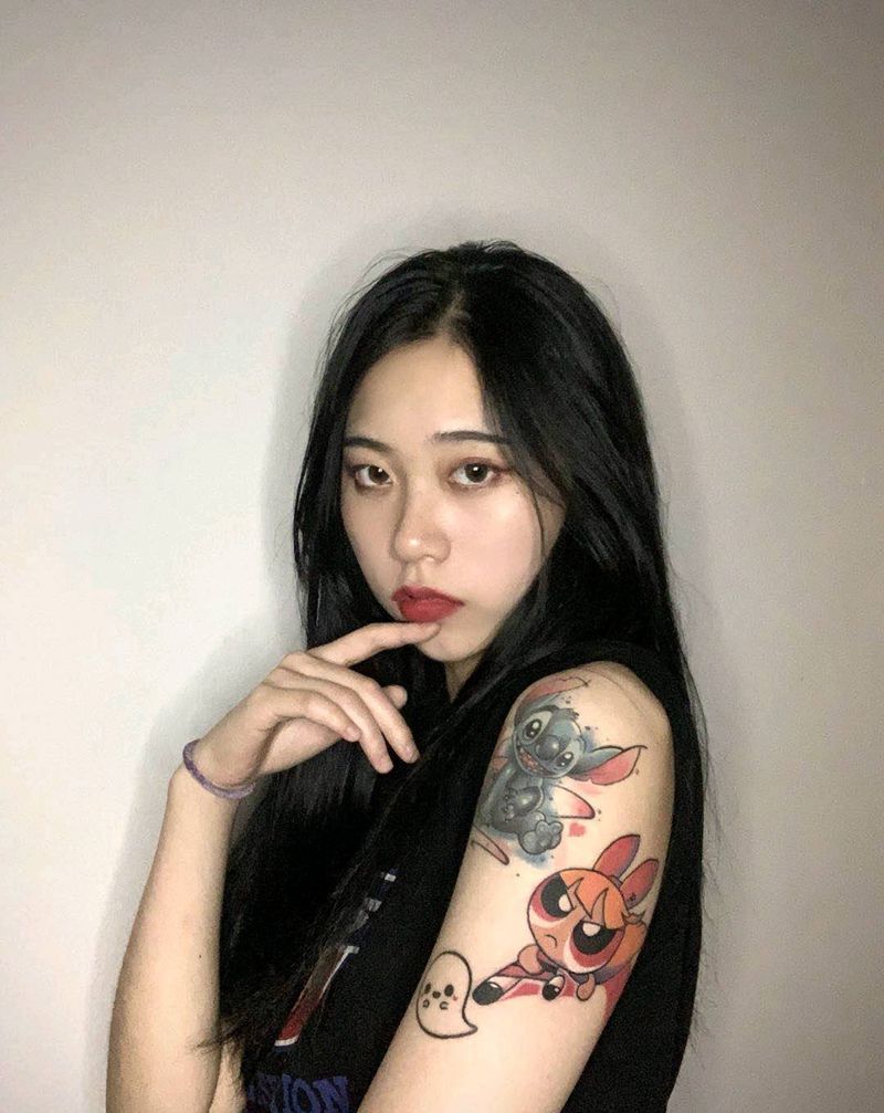 拼接买家秀纹身图片_手臂水彩New School卡通纹身图案