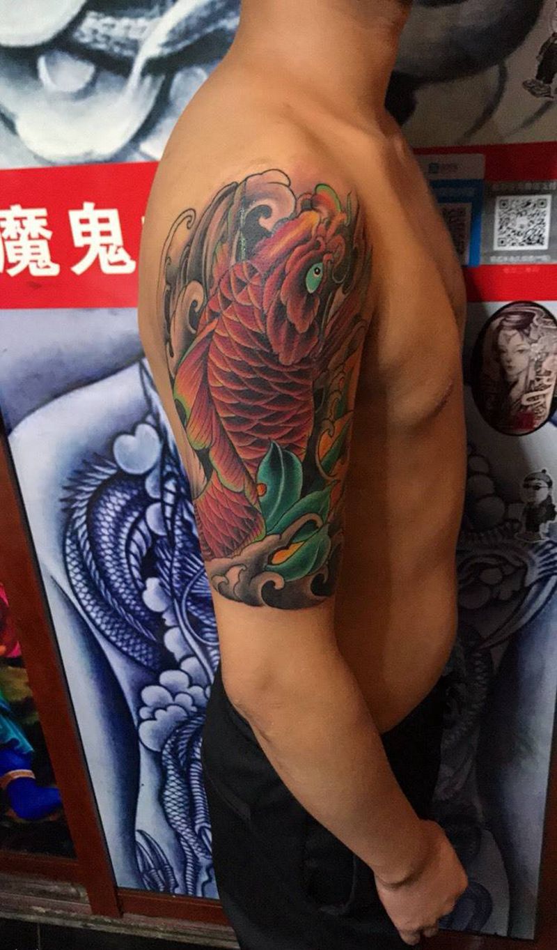 鲤鱼遮盖纹身图片