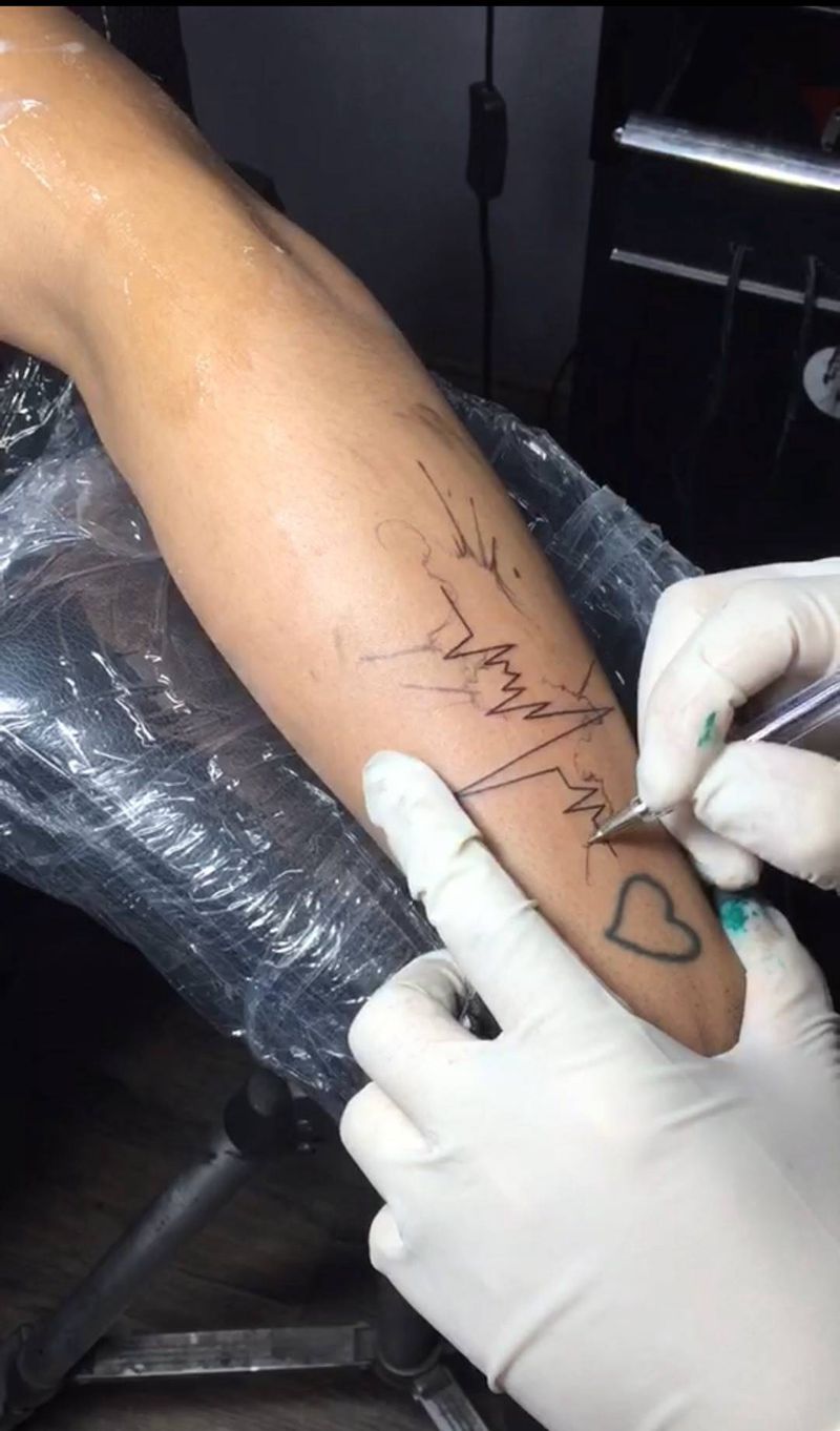 水彩纹身图片_手臂水彩纹身图案