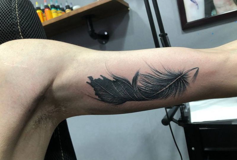 羽毛遮盖纹身图片