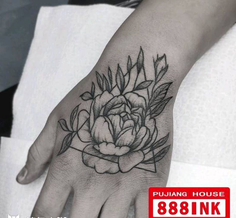 手背几何素花纹身图片_手部点刺纹身图案