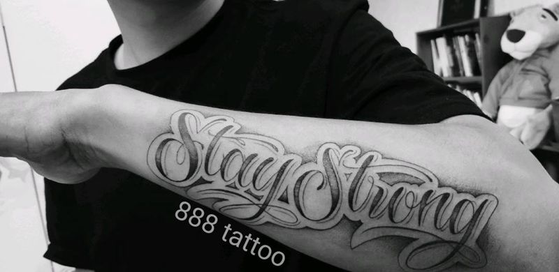 花体字纹身图片_手臂花体字纹身图案