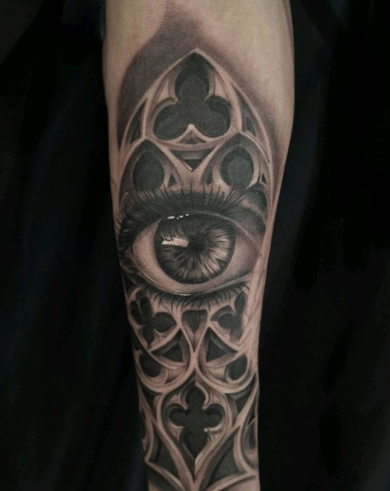 卡姿兰大眼睛纹身图片_手臂欧美写实纹身图案