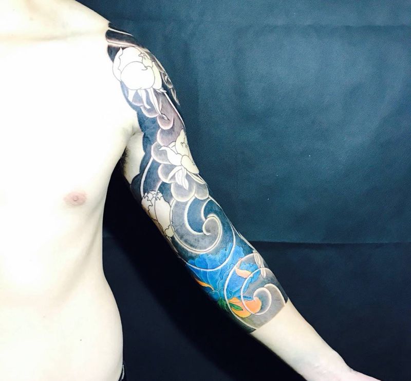 牡丹7分花臂纹身图片