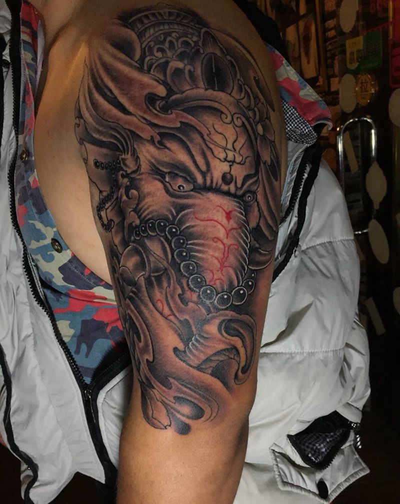 大臂象神完成纹身图片