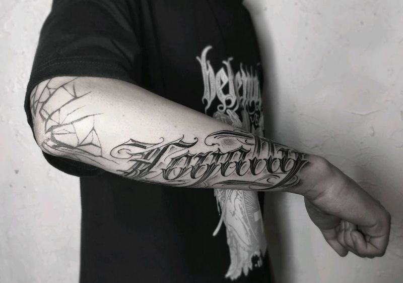 奇卡诺花体字纹身图片_手臂花体字纹身图案