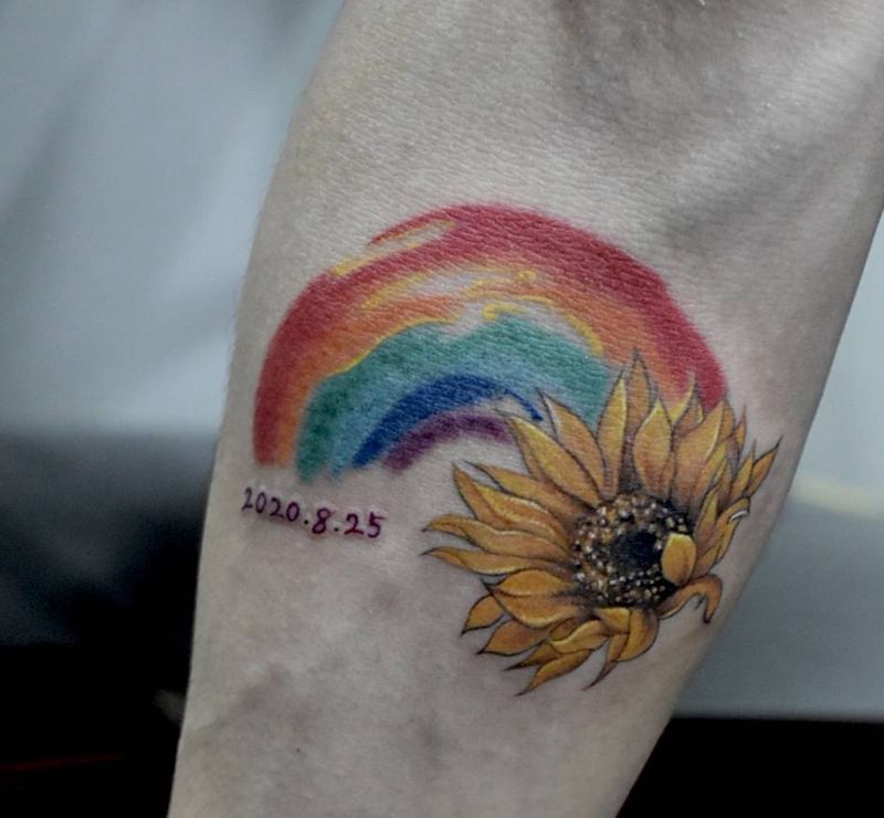 灿烂的阳光彩虹纹身图片_手臂欧美写实水墨纹身图案
