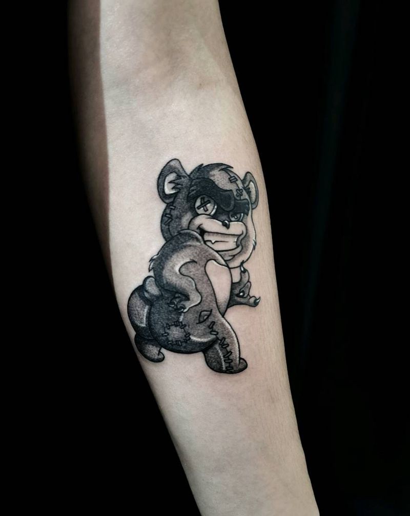 嘲讽熊纹身图片_手臂点刺欧美写实卡通纹身图案