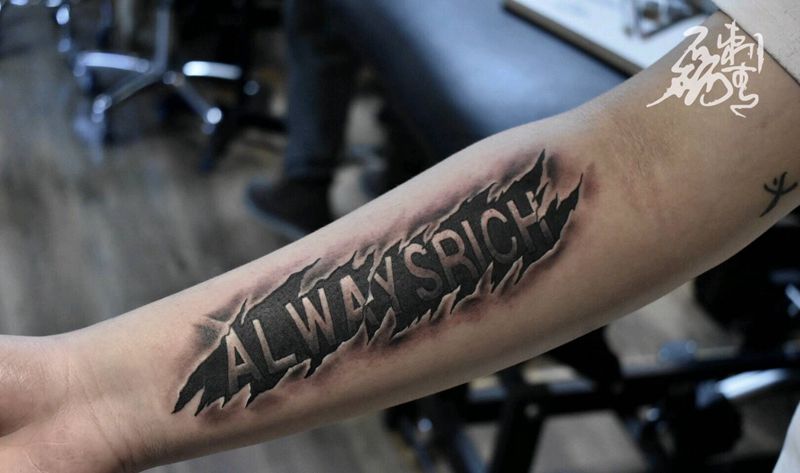 无限的财富纹身图片_手臂欧美写实纹身图案