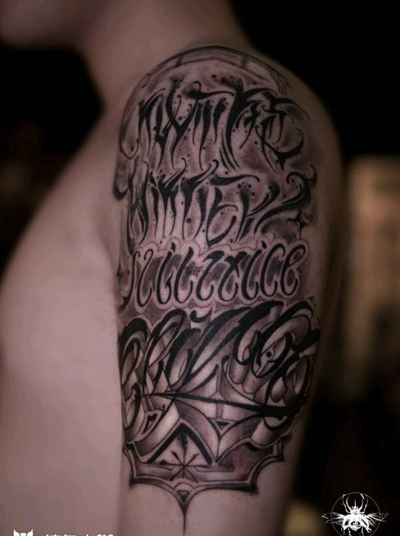 正义才是唯一的赢家花体字纹身图片_手臂图腾花体字纹身图案