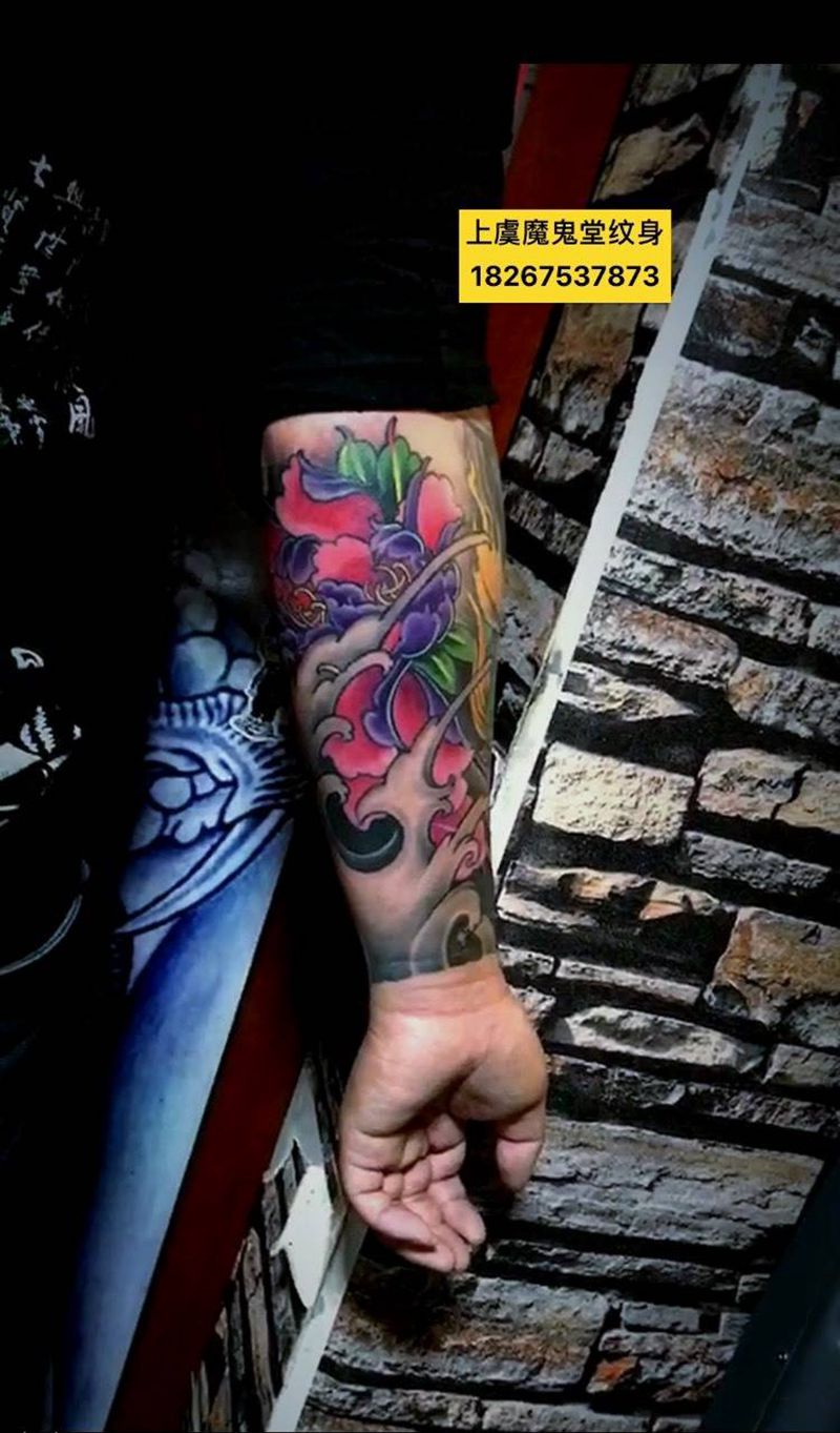 唐狮牡丹纹身图片