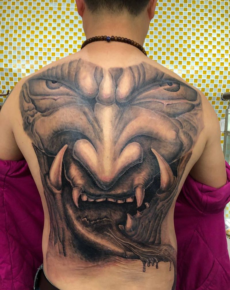 长舌鬼面纹身图片